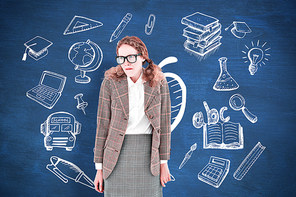 Geeky hipster woman looking nervous against blue chalkboard