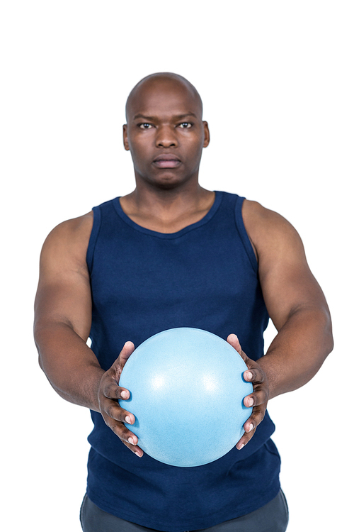Muscular man working out with weight on white background