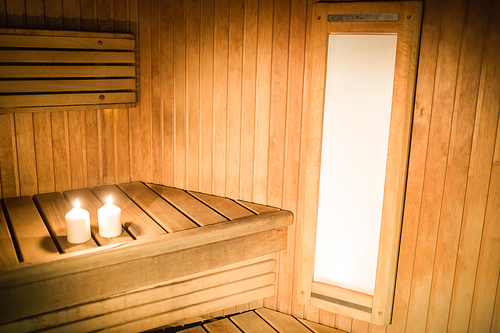 Candles lighting in a sauna at the spa