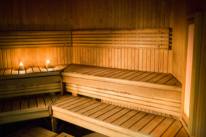 Candles lighting in a sauna at the spa