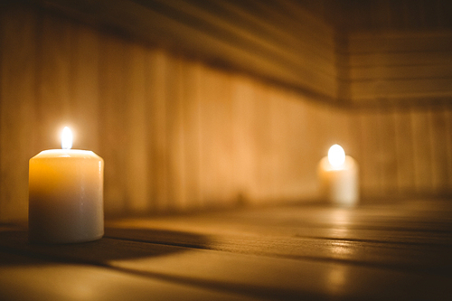 Close up of lit candles in the sauna