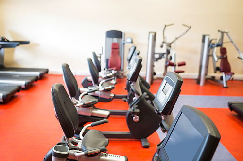 Selection of different exercise machines at the gym