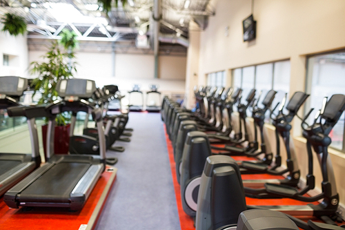 Treadmills and cross trainer machines at the gym