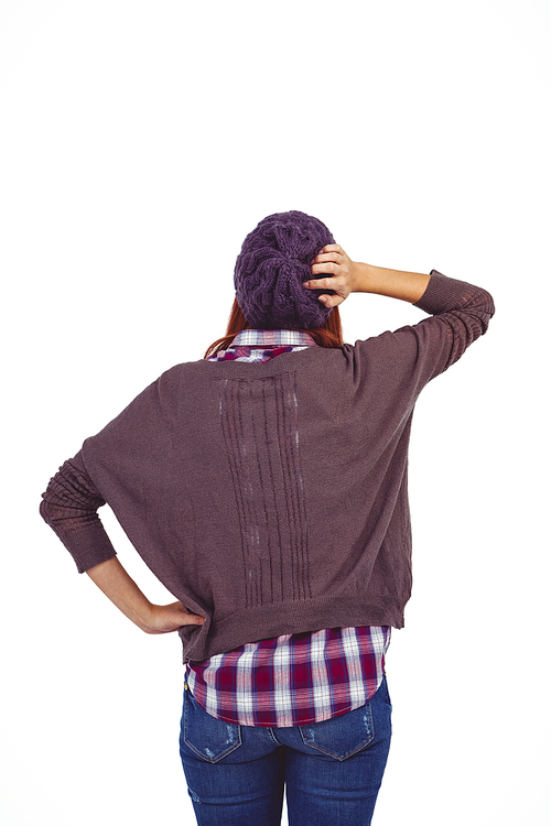 Rear view of a hipster woman against white background