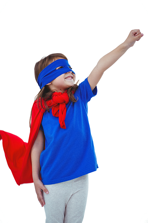 Masked girl pretending to be superhero raising fist on white screen