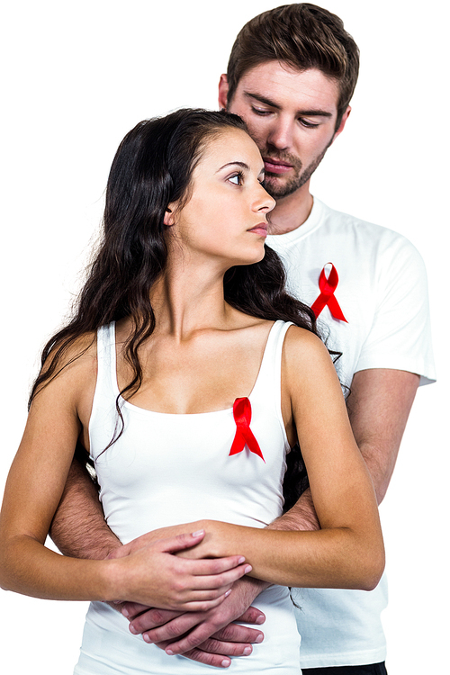Couple hugging with red ribbons on white background