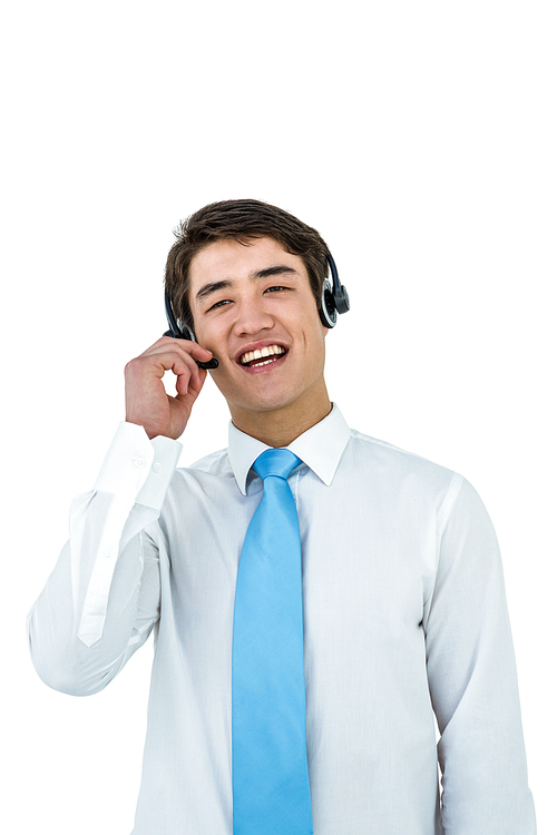 Smiling asian businessman using headset on white screen