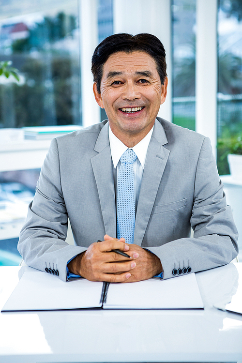 Portrait of smiling asian businessman