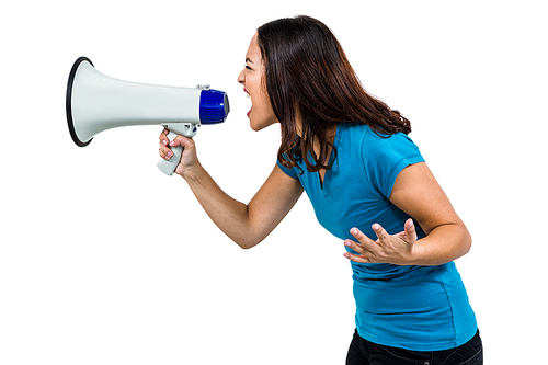 Woman shouting while holding megaphone on white background