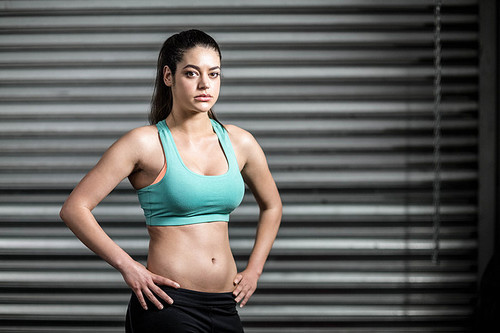 Portrait of fit woman at crossfit gym