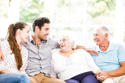 Happy family smiling at home