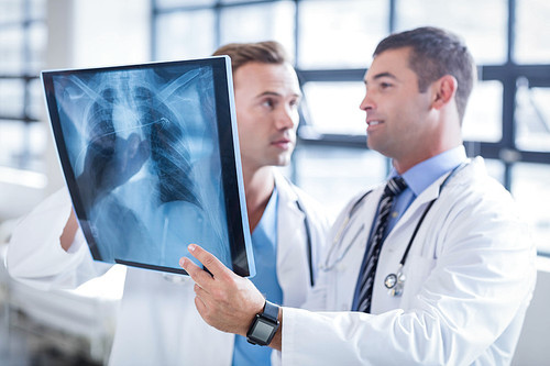 Doctors discussing an xray at the hospital