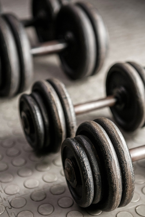 Heavy dumbbells at the crossfit gym