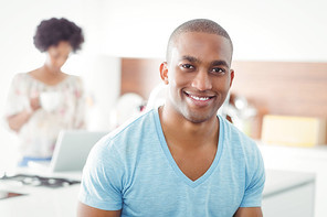 Portrait of smiling man in the kitchen at home