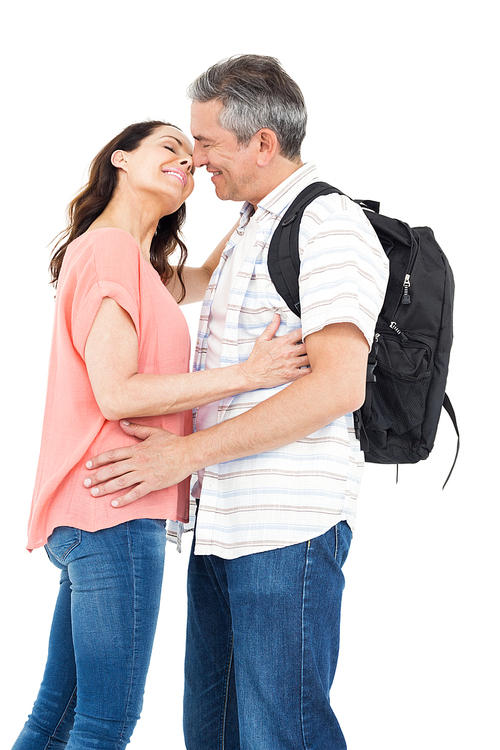 Couple about to kiss on white background