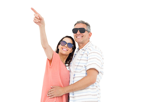 Portrait of smiling couple on white background