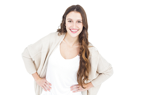 Woman with hands on hips on white background