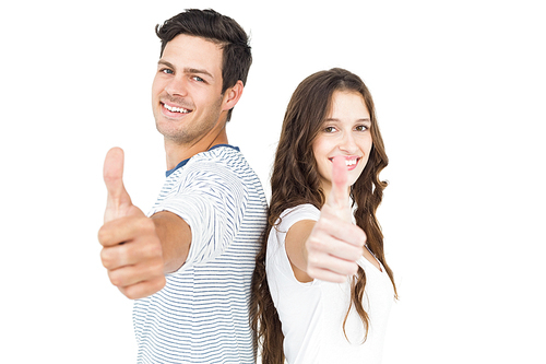 Couple standing back to back with thumbs up on white background