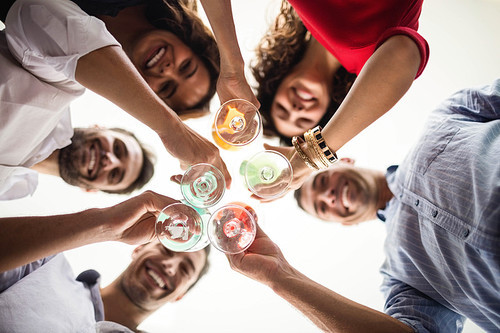 Group of friends having cocktail at the party