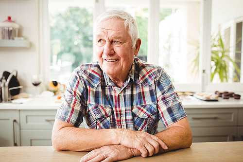 Portrait of happy senior man smiling