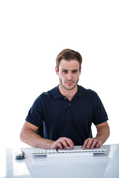 Handsome man using computer on white background