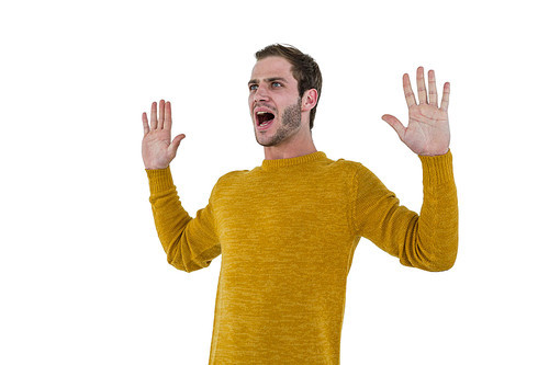 Hipster man screaming on white background