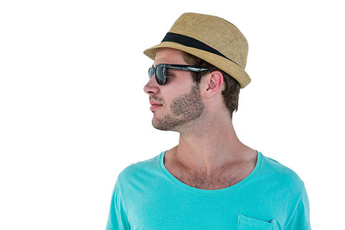 Hipster man posing with sunglasses and hat on white background