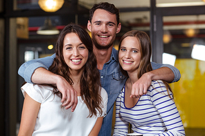 Portrait of smiling friends at the bar