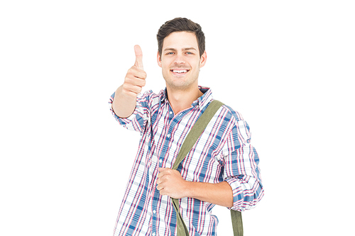 Portrait of smiling male student showing a thumbs up on white background