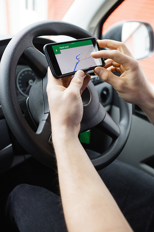 Man using his smartphone as navigation system
