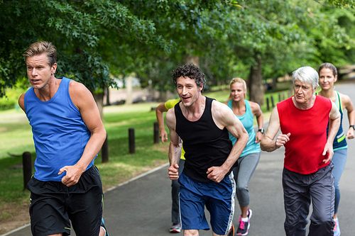 Marathon athletes running in park