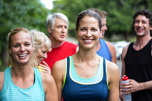 Marathon female athlete posing in park