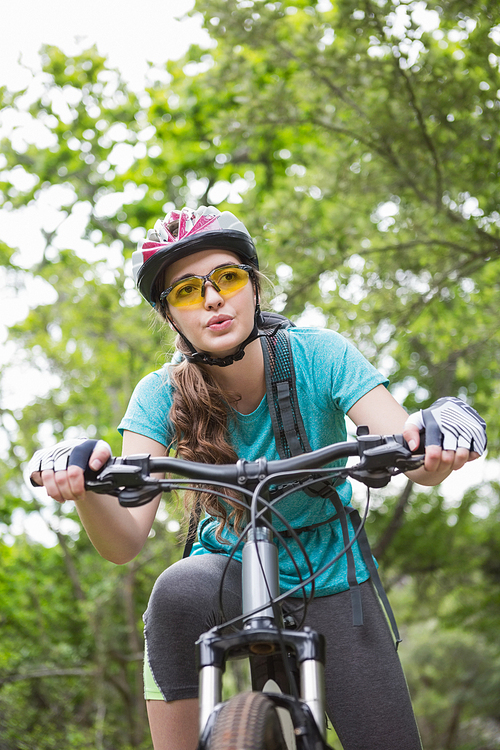 Woman riding her bike in the countryside