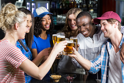 Portrait of friends having a drink in a bar