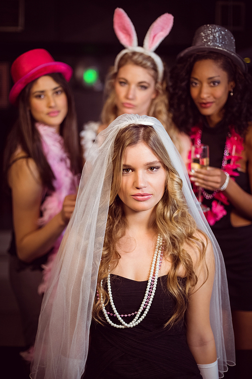 Friends celebrating bachelorette party in a nightclub