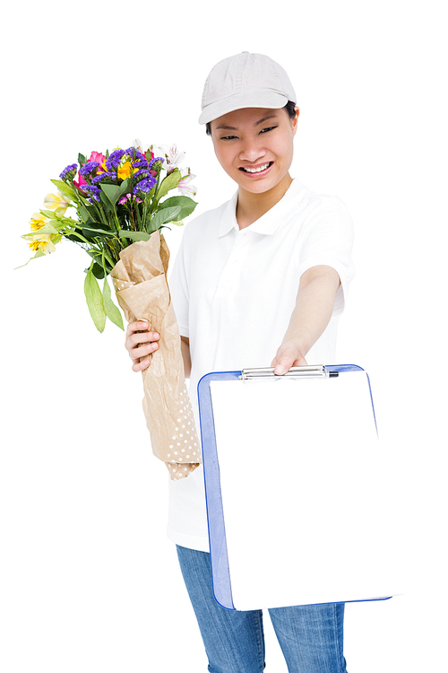 Portrait of delivery woman with bouquet and clipboard on white background