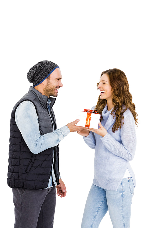 Man giving gift to woman on white background