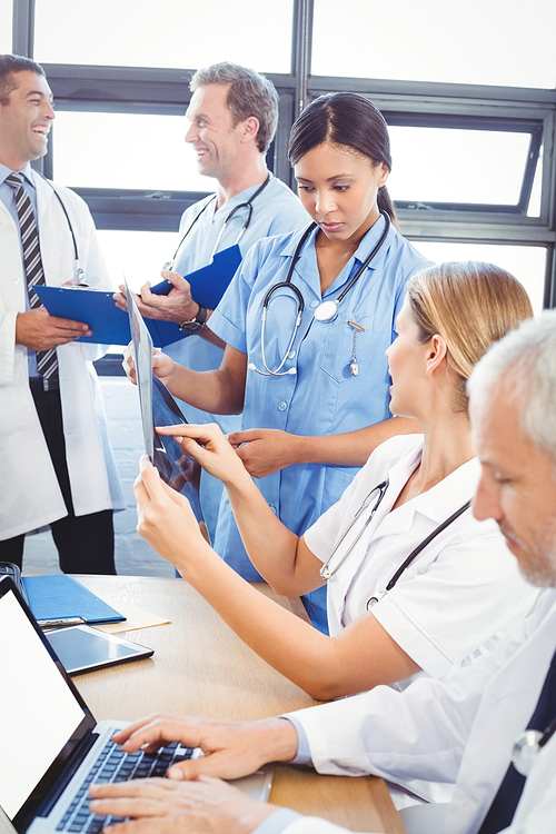 Medical team interacting at a meeting in conference room