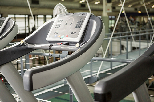 Row of treadmill at gym