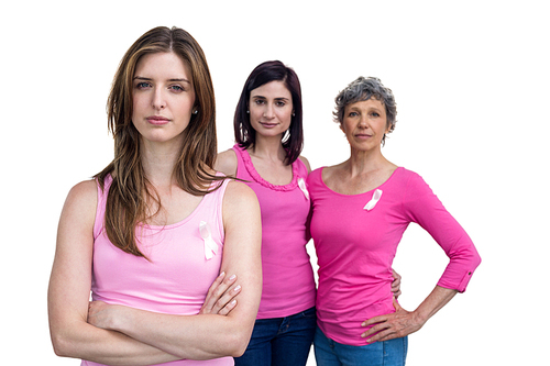 Women in pink outfits posing for breast cancer awareness on white background