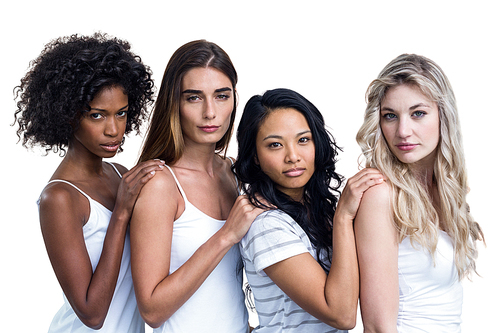 Portrait of multiethnic women standing in a line on white background