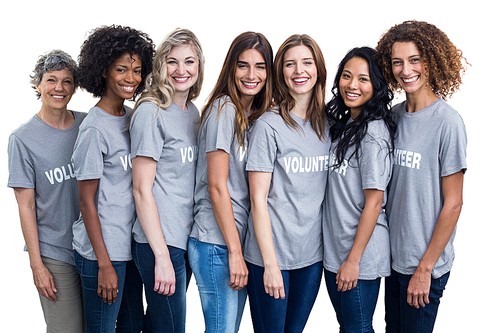 Portrait of happy volunteers standing on white background