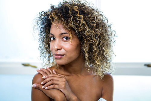 Happy young woman smiling at camera