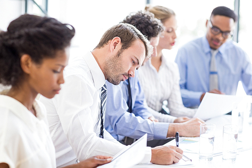 Businesspeople working together in office