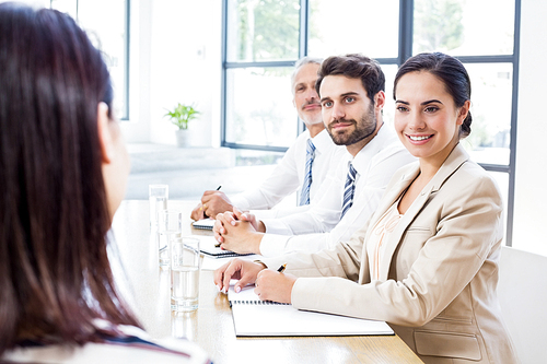 Business colleagues discussing in a meeting at office