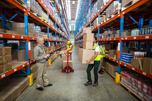View of workers are working together in a warehouse