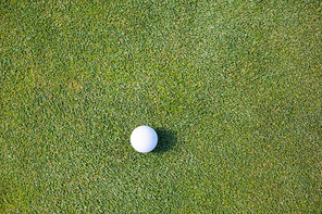 Directly above shot of golf ball on field