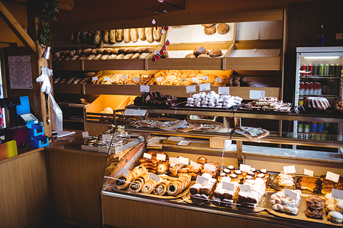 Close-up of various sweet foods in bakery shop