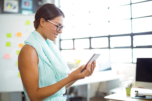 Business executive using digital tablet in office