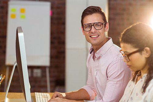 Man working on computer in office